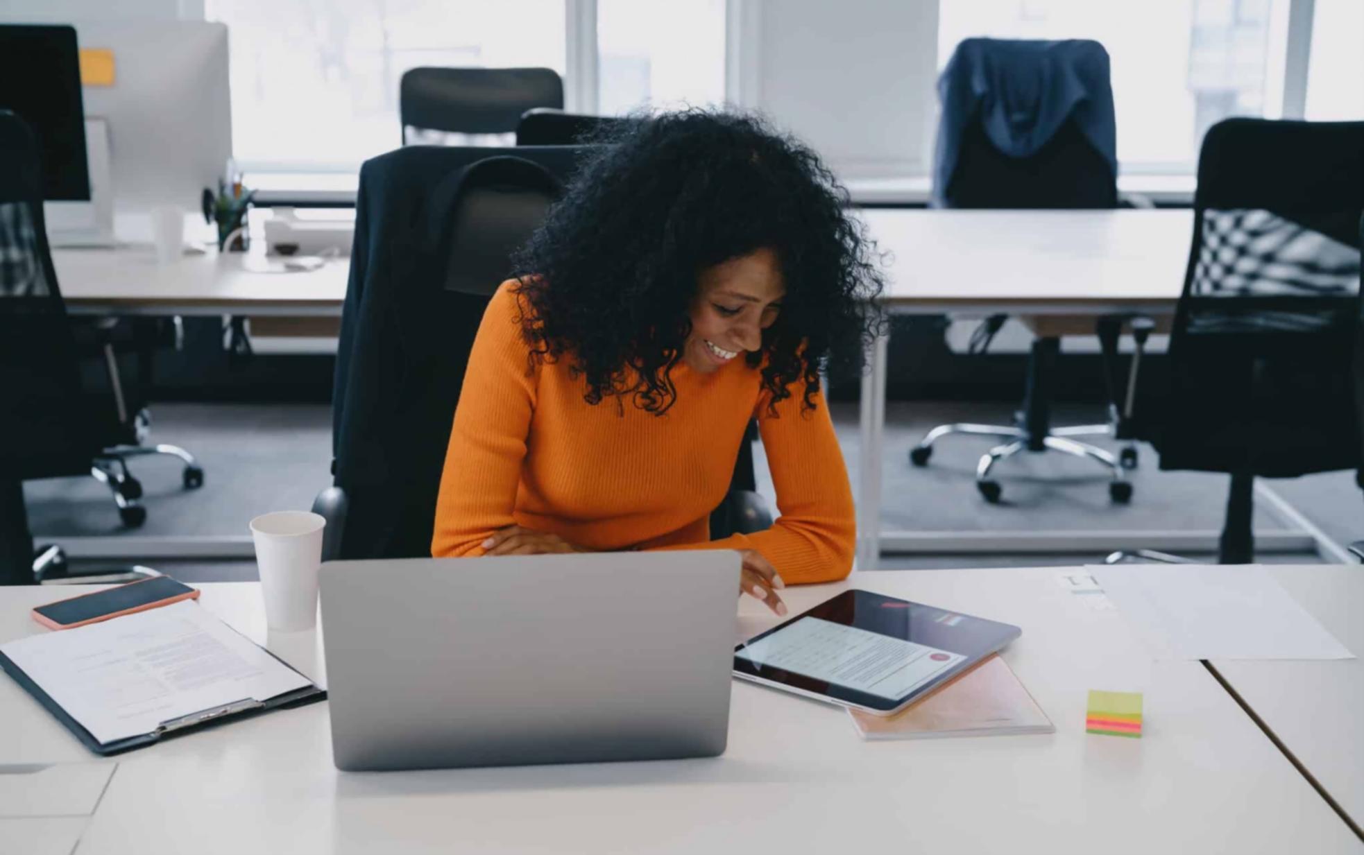 Financial analyst reviewing detailed spreadsheet models with multiple scenarios