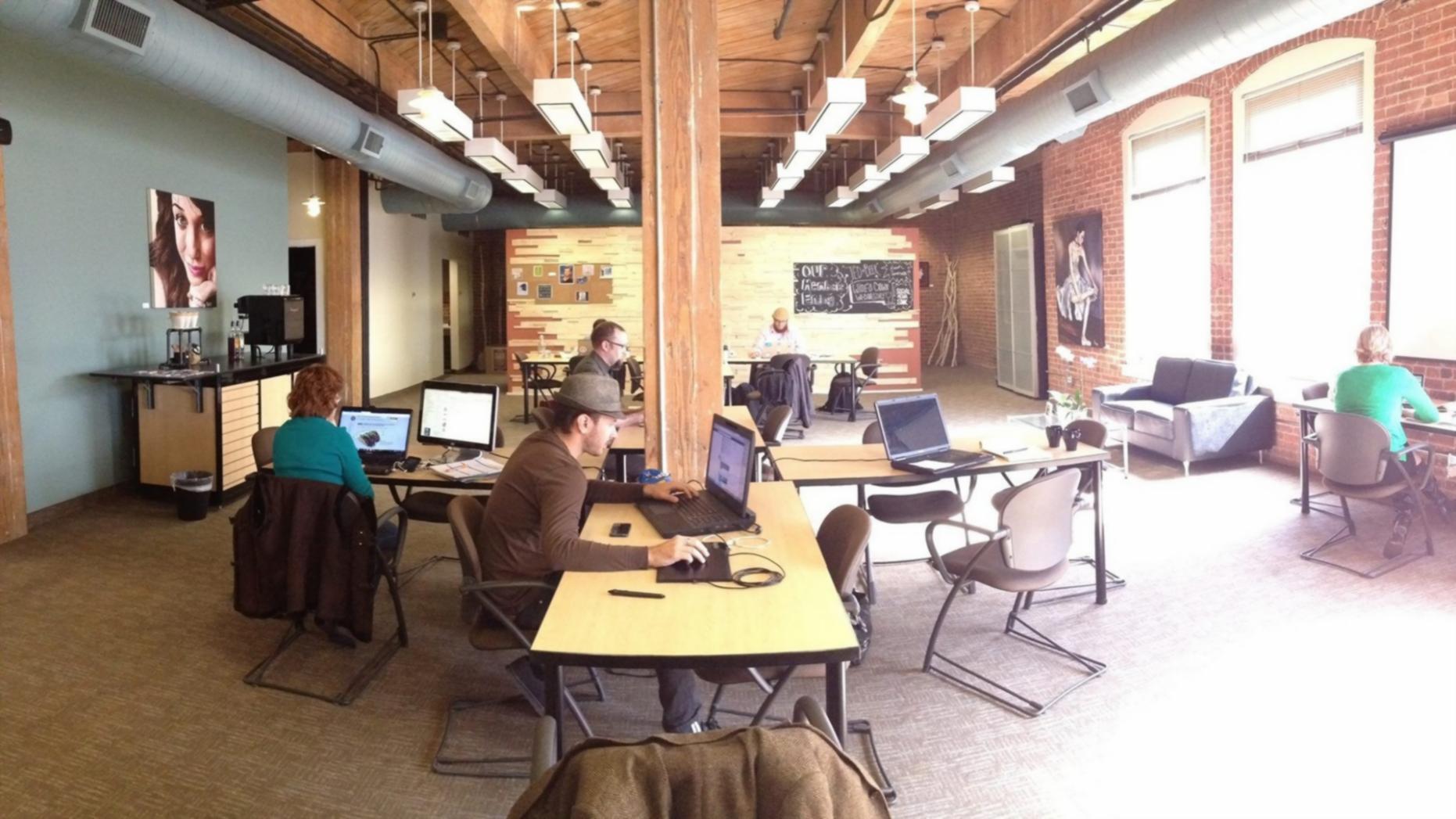 Collaborative financial analysis session with team reviewing models